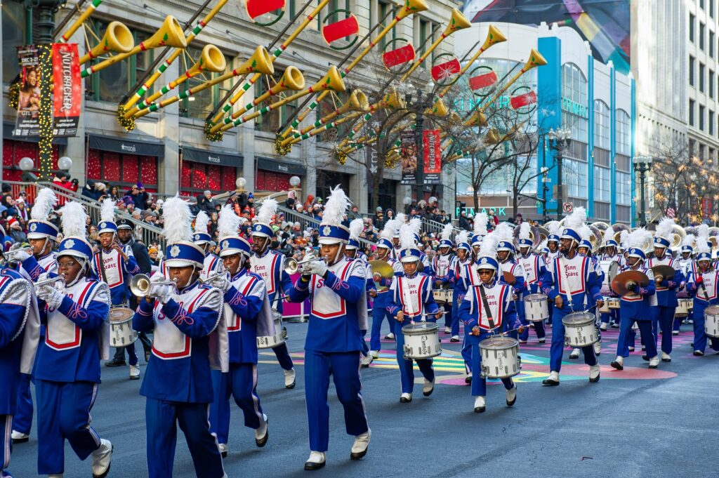 The Tennessee State Marching Band, known as the Aristocrat of Bands, marches through the TV Zone during the 2023 Chicago Thanksgiving Parade.