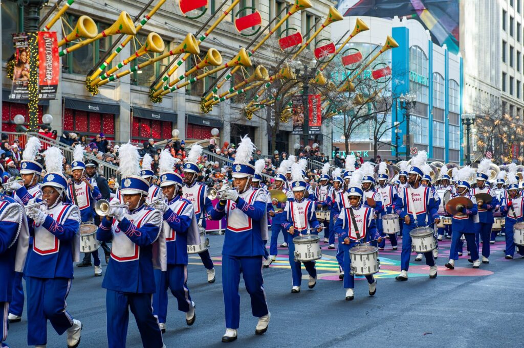 The Tennessee State Marching Band, known as the Aristocrat of Bands, marches through the TV Zone during the 2023 Chicago Thanksgiving Parade.