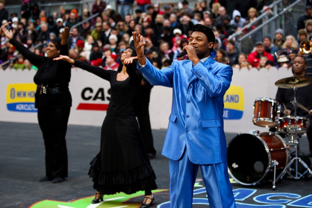 The Black Ensemble Theater performs a selection from the Jackie Wilson Story during the Chicago Thanksgiving Parade.