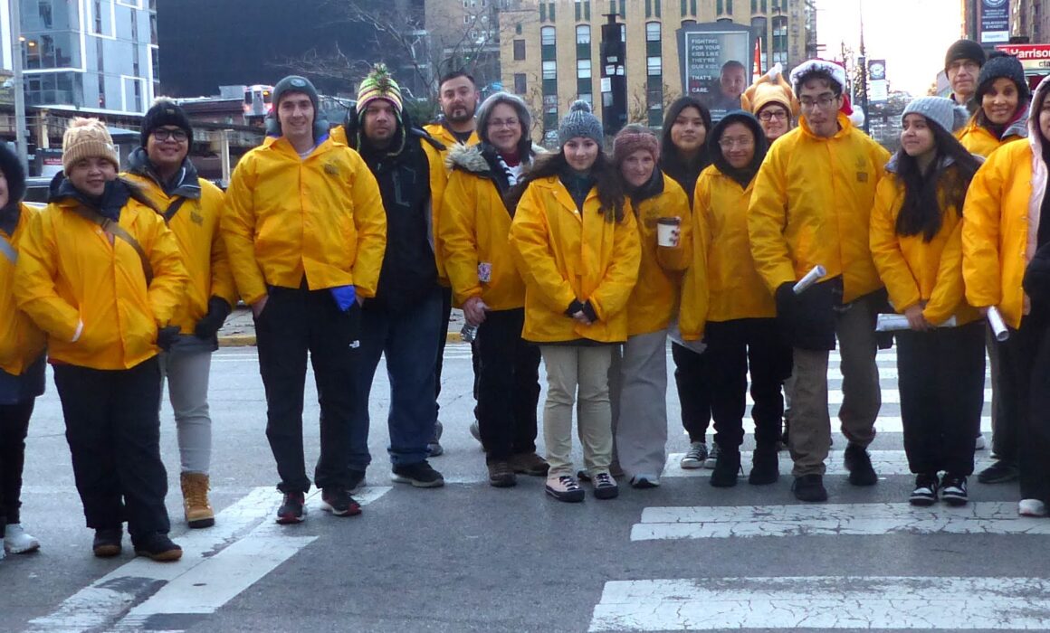 The Staging and Integration Team from the 2023 Chicago Thanksgiving Parade, standing in the staging zone of the parade.