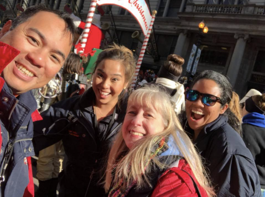 Photo (from left to right) of Anton Eleazar, former Event Manager Zaida DeGuzman, Cheryl Wyskup, and former Event Manager Brittany Johnson behind the Santa Claus float the Chicago Thanksgiving Parade.

Photo Credit - Anton Eleazar